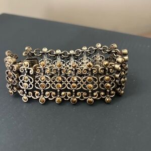 Costume Jewelry, large ornamental bracelet, gold bronze  with amber stones